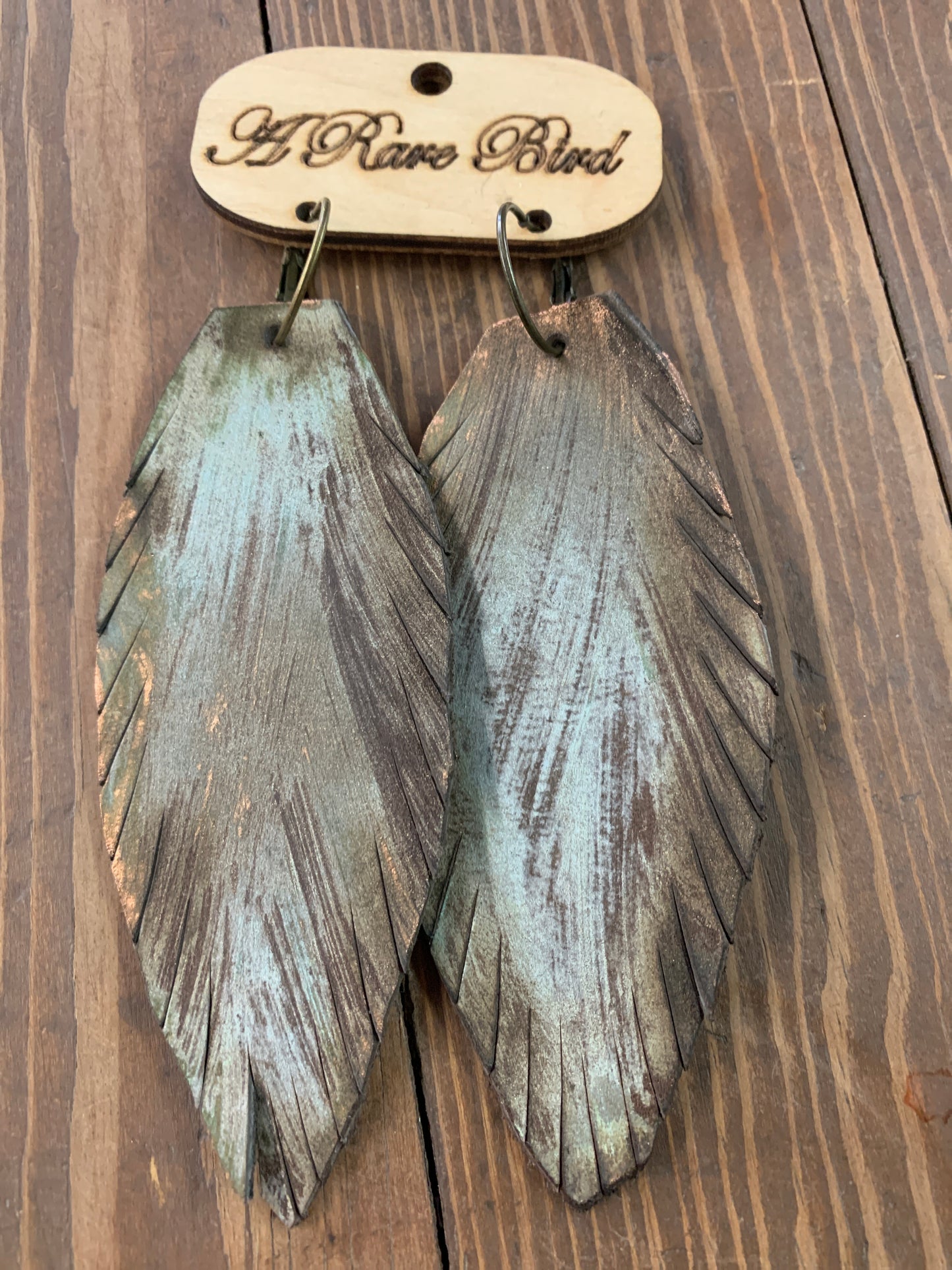 Leather feather earrings