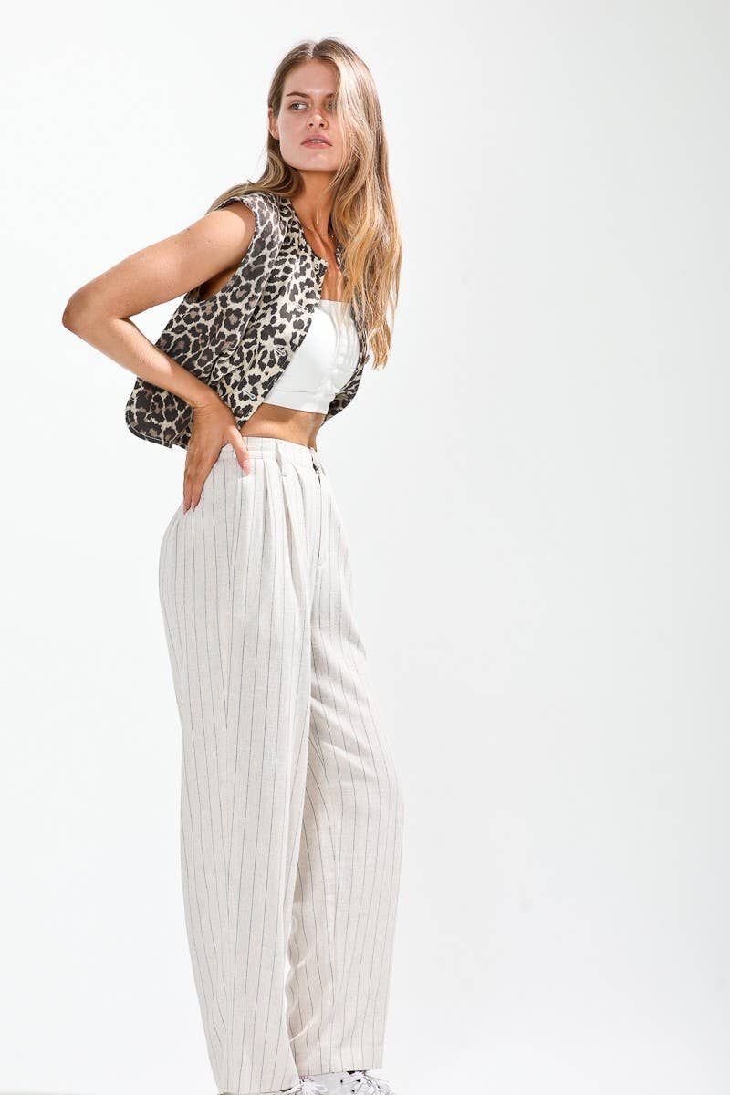 Leopard printed button down vest.