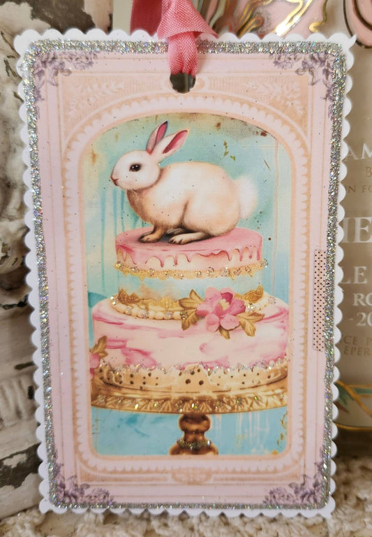 Gift Tag Bunny Sitting On A Cake